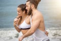 Happy afro american couple having fun together on a beach Royalty Free Stock Photo