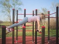 Woman Doing Push Ups in the Park Royalty Free Stock Photo