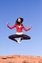 Young athletic woman jumping