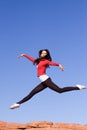 Young athletic woman jumping