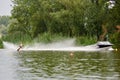 Young woman waterskiing