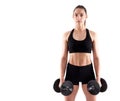 Young athletic woman working out with dumbbells Royalty Free Stock Photo