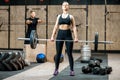 Woman lifting up a burbell in the gym Royalty Free Stock Photo