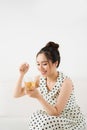 Young attractive asian woman drinking hot tea Royalty Free Stock Photo