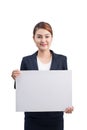 Young attractive asian woman showing a white board Royalty Free Stock Photo