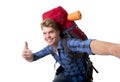 Young attractive backpacker tourist taking selfie photo carrying backpack ready for travel