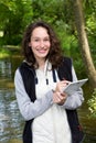 Young attractive biologist woman working on water analysis