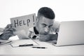 Young attractive business man feeling stressed at work asking for help Royalty Free Stock Photo