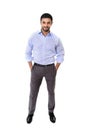 Young attractive business man standing in corporate portrait isolated on white background Royalty Free Stock Photo