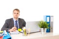 Young attractive businessman working busy with laptop computer holding pen thoughtful smiling Royalty Free Stock Photo