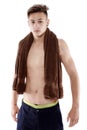 Young attractive caucasian man swimmer with goggles and towel is Royalty Free Stock Photo