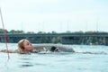 Young attractive Caucasian woman floating in the water Royalty Free Stock Photo