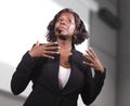 Young attractive and confident black African American business woman with headset speaking in auditorium at corporate training Royalty Free Stock Photo