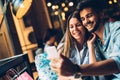 Young attractive couple on date in coffee shop Royalty Free Stock Photo