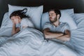 Young Attractive Couple Having Problem in Bed Royalty Free Stock Photo