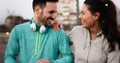 Young attractive couple running outside on sunny day Royalty Free Stock Photo