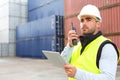 Young Attractive docker using tablet at work