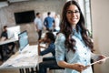 Young attractive architect working in modern office Royalty Free Stock Photo