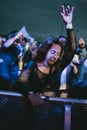 Young attractive female dancing during the electronic music festival Electrifinity in Bad Aibling