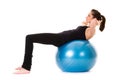 Young attractive female exercise using ball