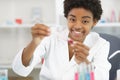 young attractive female scientist researching in laboratory Royalty Free Stock Photo