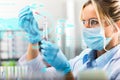 Young attractive female scientist researching in the laboratory Royalty Free Stock Photo