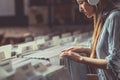 Young attractive girl browsing records Royalty Free Stock Photo