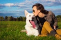 Young attractive girl with her pet dog Royalty Free Stock Photo