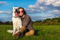 Young attractive girl with her pet dog Royalty Free Stock Photo