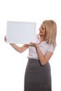 Young attractive girl holding empty message board