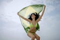 Young attractive girl jumping with Brazil flag in the air Royalty Free Stock Photo