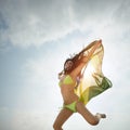 Young attractive girl jumping with Brazil flag in the air Royalty Free Stock Photo