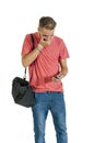 Young attractive guy laughing at message on his mobile phone Royalty Free Stock Photo