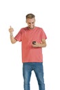 Young attractive guy working with his mobile phone Royalty Free Stock Photo