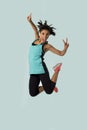Young attractive and happy Latin sport woman jumping excited and cheerful in gym exercise workout healthy lifestyle Royalty Free Stock Photo