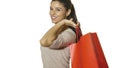 Young attractive and happy latin woman holding red shopping bag smiling cheerful and positive isolated on white background in sale Royalty Free Stock Photo