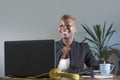 Young attractive and happy successful black afro american woman in business jacket working cheerful at office laptop computer desk Royalty Free Stock Photo