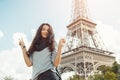 Young attractive happy woman showing peace gesture Eiffel Tower in Paris, France Royalty Free Stock Photo