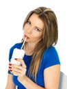 Young Attractive Healthy Unhealthy Woman Drinking a Glass of Sugar Royalty Free Stock Photo