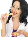 Young Attractive Healthy Woman Eating Mixed Dried Fruit Bars Royalty Free Stock Photo