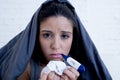 Young attractive hispanic woman lying sick at home couch in cold and flu in gripe disease symptom Royalty Free Stock Photo