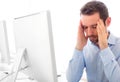 Young attractive man got a headache at the office Royalty Free Stock Photo