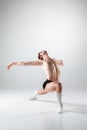 The young attractive modern ballet dancer on white Royalty Free Stock Photo