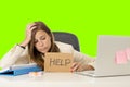 Young attractive sad and desperate businesswoman suffering stress at office laptop computer desk green croma key background Royalty Free Stock Photo