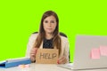 Young attractive sad and desperate businesswoman suffering stress at office laptop computer desk green croma key background Royalty Free Stock Photo