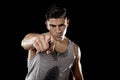 Young attractive sport man big strong athletic body pointing in join my fitness club gym concept Royalty Free Stock Photo