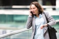 Young attractive woman being late to a rendez-vous Royalty Free Stock Photo