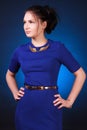 Young attractive woman in a blue evening dress Royalty Free Stock Photo