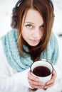 Young attractive woman drinking tea outdoors Royalty Free Stock Photo