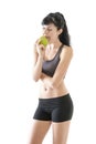 Young attractive woman eating green apple Royalty Free Stock Photo